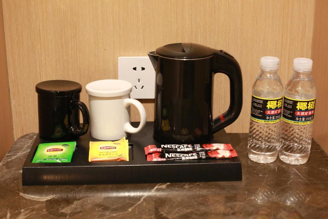 锦江都城酒店海南省政府日月广场免税店 Хайкоу Екстериор снимка